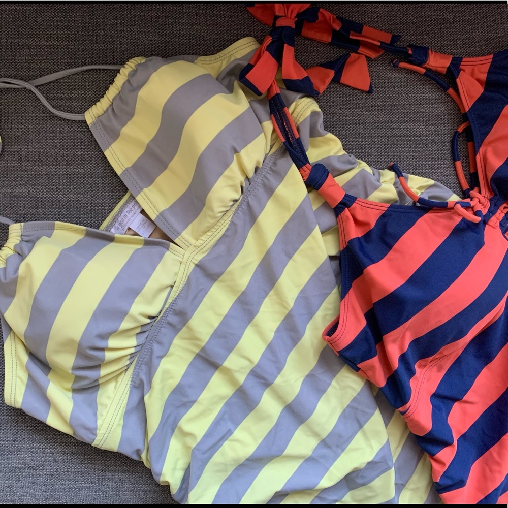 A Pair of Designer Maternity Swimsuit tanks